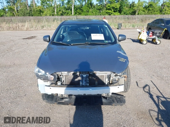 2015 Mitsubishi Lancer SE with VIN JA32V2FWXFU023626, listed as a IAAI auction lot 42012381 with 143,981 mi miles. Bid and sale history available at carsss.com. Image 12.