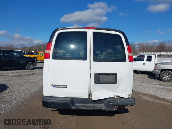 2014 Chevrolet Express Cargo Van with VIN 1GCWGFCA2E1148147, listed as a IAAI auction lot 41101132 with 110,648 mi miles. Bid and sale history available at carsss.com. Image 15.