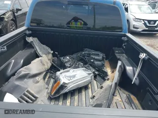 2019 Toyota Tacoma 4WD SR with VIN 3TMCZ5AN0KM260201, listed as a IAAI auction lot 42017048 with 49,216 mi miles. Bid and sale history available at carsss.com. Image 12.