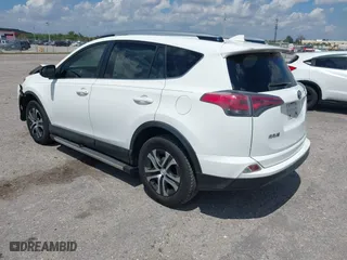 2017 Toyota RAV4 LE with VIN JTMZFREV2HJ711557, listed as a IAAI auction lot 41894094 with 167,645 mi miles. Bid and sale history available at carsss.com. Image 3.