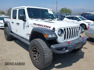 2021 Jeep Gladiator Rubicon с VIN 1C6JJTBG6ML504934, выставлен на аукционе IAAI как лот 42451700 с пробегом 49 952 миль миль и . История ставок и продаж доступна на DreamBid. Изображение 1.