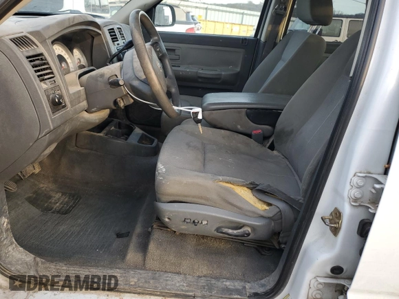2006 Dodge Dakota SLT with VIN 1D7HE48K46S521050, listed as a Copart auction lot 87286144 with 252,799 mi miles and Salvage Title. Bid and sale history available at DreamBid. Image 7.