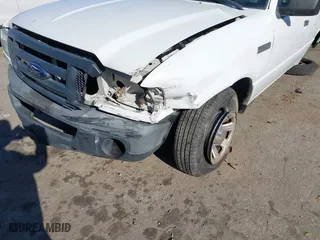 2009 Ford Ranger XL with VIN 1FTYR10DX9PA03395, listed as a IAAI auction lot 41103826 with 124,257 mi miles. Bid and sale history available at carsss.com. Image 6.