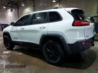 2015 Jeep Cherokee Trailhawk with VIN 1C4PJMBS7FW609741, listed as a Copart auction lot 55991595 with 125,711 mi miles and Clean title. Bid and sale history available at DreamBid. Image 2.