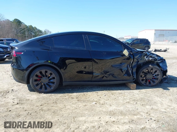 2021 Tesla Model Y Performance with VIN 5YJYGDEF6MF252877, listed as a IAAI auction lot 41770770 with 58,550 mi miles and . Bid and sale history available at DreamBid. Image 13.