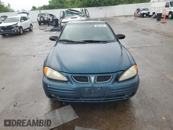 2002 Pontiac Grand Am SE z VIN 1G2NE52F92C172605, wystawiony jako Copart lot #56541555 z przebiegiem 164 600 mil mil oraz Szkoda całkowita • Salvage title. Historia ofert i sprzedaży dostępna na DreamBid. Obrazek 5.