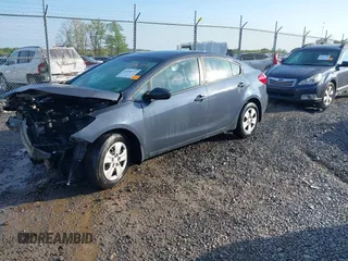 2016 Kia Forte LX z VIN KNAFK4A68G5477333, wystawiony jako IAAI lot #42196777 z przebiegiem 77 805 mil mil oraz . Historia ofert i sprzedaży dostępna na DreamBid. Obrazek 2.