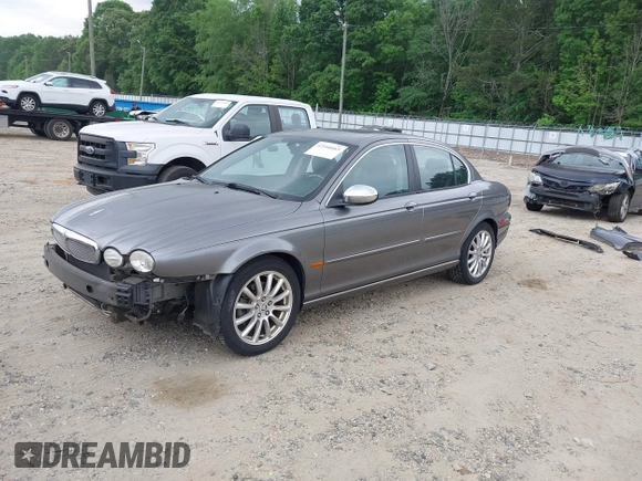 2007 Jaguar X-Type z VIN SAJWA51A17WJ07837, wystawiony jako IAAI lot #42166665 z przebiegiem 74 297 mil mil oraz . Historia ofert i sprzedaży dostępna na DreamBid. Obrazek 2.
