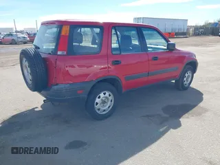 1999 Honda CR-V LX with VIN JHLRD1841XC071583, listed as a IAAI auction lot 41657213 with 208,874 mi miles. Bid and sale history available at carsss.com. Image 4.