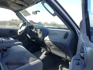 2003 Ford F-150 XLT with VIN 1FTRW08LX3KC79700, listed as a IAAI auction lot 41680562 with 131,052 mi miles. Bid and sale history available at carsss.com. Image 5.