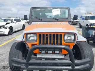 1991 Jeep Wrangler with VIN 2J4FY29SXMJ105443, listed as a IAAI auction lot 41964359 with 1,674,923 mi miles. Bid and sale history available at carsss.com. Image 6.