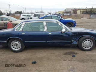 1998 Jaguar XJ Vanden Plas with VIN SAJKX6246WC832202, listed as a IAAI auction lot 41218807 with 96,589 mi miles and . Bid and sale history available at DreamBid. Image 13.