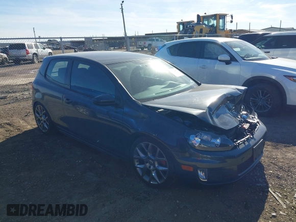 2012 Volkswagen GTI w/Conv & Sunroof with VIN WVWEV7AJ6CW161963, listed as a IAAI auction lot 41398810 with 172,582 mi miles and . Bid and sale history available at DreamBid. Image 1.