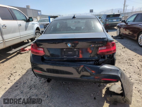 2015 BMW 2 Series M235i xDrive with VIN WBA1J9C5XFV371057, listed as a Copart auction lot 51994765 with 189,788 mi miles and Salvage Title. Bid and sale history available at carsss.com. Image 6.