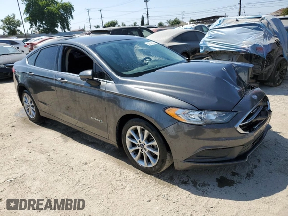 2017 Ford Fusion Hybrid SE with VIN 3FA6P0LU0HR355272, listed as a Copart auction lot 62834325 with 147,572 mi miles and Clean title. Bid and sale history available at DreamBid. Image 4.