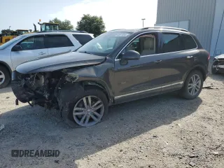 2016 Volkswagen Touareg Sport с VIN WVGEF9BPXGD012867, выставлен на аукционе Copart как лот 63877534 с пробегом 106 005 миль миль и Списание • Salvage title. История ставок и продаж доступна на DreamBid. Изображение 1.