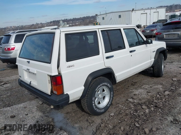 1996 Jeep Cherokee Sport with VIN 1J4FJ68S6TL234012, listed as a IAAI auction lot 41571658 with 255,817 mi miles. Bid and sale history available at carsss.com. Image 4.