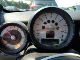 2013 MINI Roadster S z VIN WMWSY3C58DT594039, wystawiony jako Copart lot #65833804 z przebiegiem Nie podano mil oraz Szkody całkowita. Historia ofert i sprzedaży dostępna na DreamBid. Obrazek 9.
