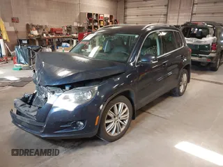2011 Volkswagen Tiguan SE with VIN WVGBV7AXXBW533872, listed as a IAAI auction lot 40197835 with 104,685 mi miles and . Bid and sale history available at DreamBid. Image 17.