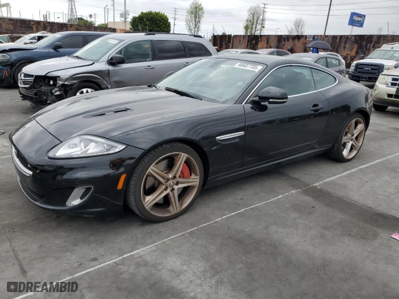 2013 Jaguar XK with VIN SAJWA4DC6DMB50779, listed as a Copart auction lot 50687705 with 106,826 mi miles and Clean Title. Bid and sale history available at carsss.com. Image 1.