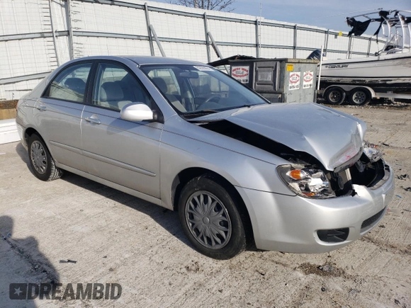 2009 Kia Spectra LX with VIN KNAFE221895659552, listed as a Copart auction lot 82555924 with 114,704 mi miles and Salvage Title. Bid and sale history available at carsss.com. Image 4.