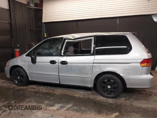 2002 Honda Odyssey LX z VIN 2HKRL18532H573727, wystawiony jako IAAI lot #42266783 z przebiegiem 127 491 mil mil oraz . Historia ofert i sprzedaży dostępna na DreamBid. Obrazek 6.