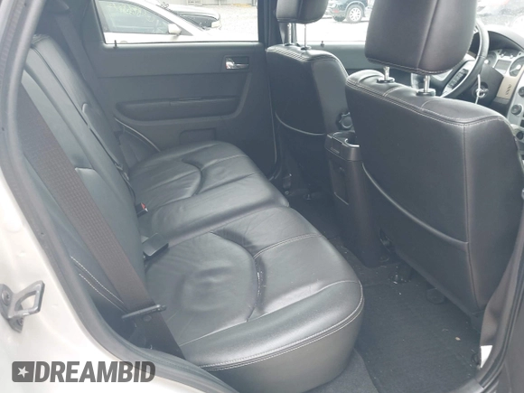 2008 Mercury Mariner Premier with VIN 4M2CU87108KJ01466, listed as a IAAI auction lot 42634600 with 95,436 mi miles and . Bid and sale history available at DreamBid. Image 8.