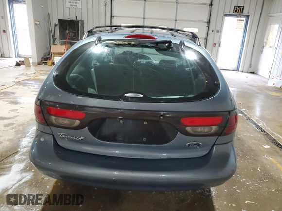 1999 Ford Taurus SE z VIN 1FAFP58S0XG301691, wystawiony jako Copart lot #81920424 z przebiegiem 203 931 mil mil oraz Szkoda całkowita • Salvage title. Historia ofert i sprzedaży dostępna na DreamBid. Obrazek 6.