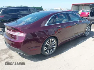 2017 Lincoln MKZ Reserve z VIN 3LN6L5F99HR648769, wystawiony jako IAAI lot #42252379 z przebiegiem 53 656 mil mil oraz . Historia ofert i sprzedaży dostępna na DreamBid. Obrazek 4.