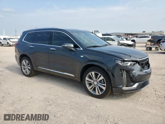 2022 Cadillac XT6 Premium Luxury z VIN 1GYKPCRS1NZ104567, wystawiony jako Copart lot #58211505 z przebiegiem 54 541 mil mil oraz Tytuł czysty. Historia ofert i sprzedaży dostępna na DreamBid. Obrazek 4.