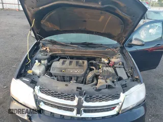 2014 Dodge Avenger SE with VIN 1C3CDZAB2EN108754, listed as a IAAI auction lot 42084617 with 144,074 mi miles. Bid and sale history available at carsss.com. Image 10.