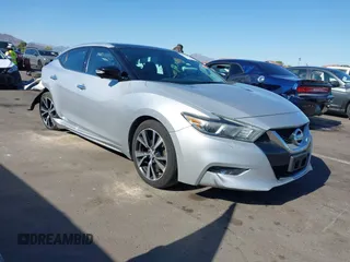 2016 Nissan Maxima SL z VIN 1N4AA6AP3GC377081, wystawiony jako IAAI lot #42235817 z przebiegiem 159 571 mil mil oraz . Historia ofert i sprzedaży dostępna na DreamBid. Obrazek 1.