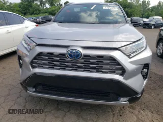 2021 Toyota RAV4 Hybrid XSE with VIN 4T3E6RFVXMU039871, listed as a Copart auction lot 61654295 with 30,775 mi miles and Salvage title. Bid and sale history available at DreamBid. Image 5.