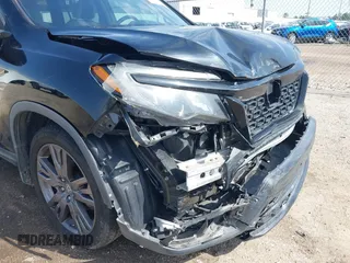 2019 Honda Passport EX-L with VIN 5FNYF7H59KB003011, listed as a IAAI auction lot 41563219 with 78,239 mi miles and . Bid and sale history available at carsss.com. Image 17.