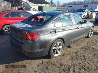 2015 BMW 3 Series 328i xDrive with VIN WBA3B5G55FNS19437, listed as a IAAI auction lot 41765832 with 137,993 mi miles. Bid and sale history available at carsss.com. Image 4.