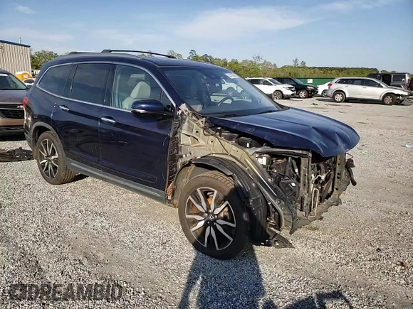 2019 Honda Pilot Touring 8-Passenger z VIN 5FNYF6H90KB000303, wystawiony jako Copart lot #52410585 z przebiegiem 129 190 mil mil oraz Szkoda całkowita • Salvage title. Historia ofert i sprzedaży dostępna na DreamBid. Obrazek 12.
