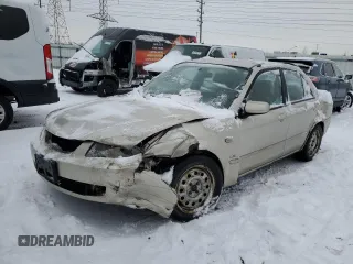 2002 Mazda Protege DX with VIN JM1BJ225321612524, listed as a Copart auction lot 45059445 with 95,209 mi miles and Salvage Title. Bid and sale history available at DreamBid. Image 1.