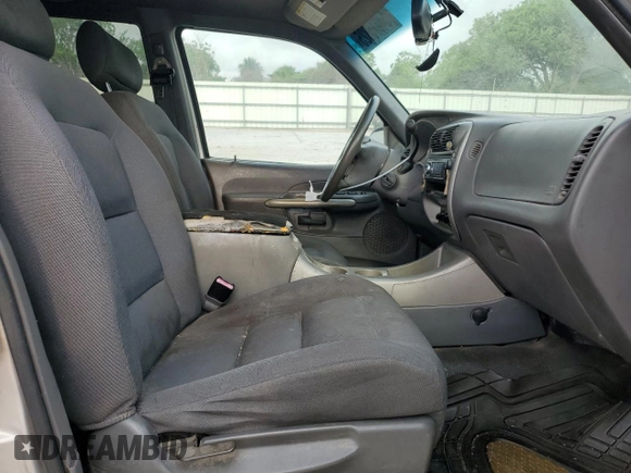 2004 Ford Explorer Sport Trac XLS z VIN 1FMDU67K74UA39405, wystawiony jako Copart lot #54615825 z przebiegiem 194 274 mil mil oraz Szkoda całkowita • Salvage title. Historia ofert i sprzedaży dostępna na DreamBid. Obrazek 7.