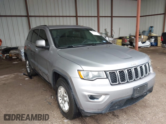 2018 Jeep Grand Cherokee Laredo E with VIN 1C4RJEAG1JC275356, listed as a IAAI auction lot 42150422 with 69,720 mi miles and . Bid and sale history available at DreamBid. Image 1.