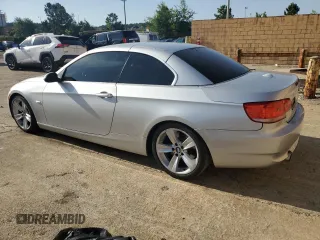 2007 BMW 3 Series 335i with VIN WBAWL73577PX48793, listed as a Copart auction lot 57129955 with 134,546 mi miles and Salvage title. Bid and sale history available at DreamBid. Image 2.