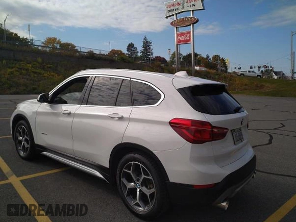 2016 BMW X1 xDrive28i with VIN WBXHT3C3XGP880243, listed as a Copart auction lot 48908425 with 56,100 mi miles and Salvage Title. Bid and sale history available at carsss.com. Image 3.