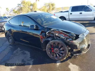 2023 Tesla Model Y Performance with VIN 7SAYGDEF6PF854797, listed as a IAAI auction lot 41319332 with 46,132 mi miles and . Bid and sale history available at DreamBid. Image 1.