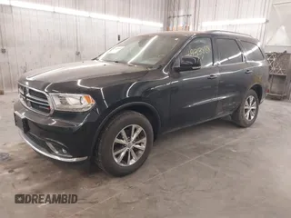 2016 Dodge Durango Limited with VIN 1C4RDJDGXGC331069, listed as a IAAI auction lot 41933888 with 164,147 mi miles and . Bid and sale history available at DreamBid. Image 2.