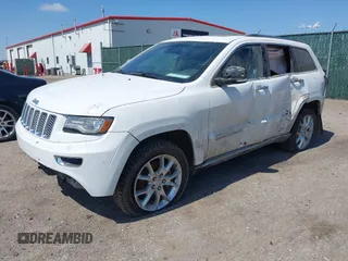 2014 Jeep Grand Cherokee Summit z VIN 1C4RJFJG3EC213145, wystawiony jako IAAI lot #41918145 z przebiegiem 176 460 mil mil oraz . Historia ofert i sprzedaży dostępna na DreamBid. Obrazek 17.