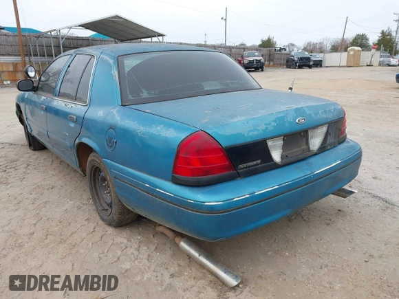 2000 Ford Crown Victoria Police Interceptor z VIN 2FAFP71W4YX136846, wystawiony jako IAAI lot #41715363 z przebiegiem 335 956 mil mil oraz . Historia ofert i sprzedaży dostępna na DreamBid. Obrazek 3.
