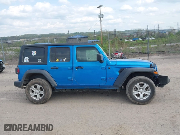 2023 Jeep Wrangler Sport with VIN 1C4HJXDG5PW530309, listed as a IAAI auction lot 42154961 with 29,846 mi miles and . Bid and sale history available at DreamBid. Image 14.