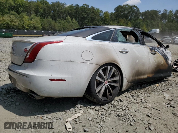2015 Jaguar XJ with VIN SAJWA3HT8FMV90734, listed as a Copart auction lot 51419894 with Not Provided miles and Salvage Title. Bid and sale history available at DreamBid. Image 3.