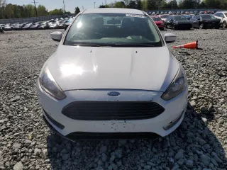 2018 Ford Focus SE with VIN 1FADP3FE4JL220247, listed as a Copart auction lot 52694315 with 25,285 mi miles and Salvage Title. Bid and sale history available at carsss.com. Image 5.