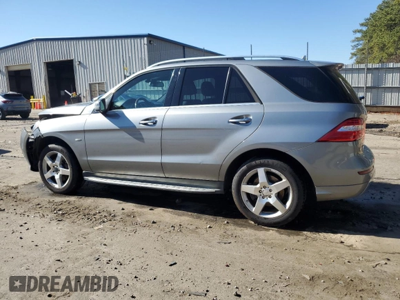 2012 Mercedes-Benz M 550 with VIN 4JGDA7DBXCA044892, listed as a Copart auction lot 43368635 with 214,619 mi miles and Salvage title. Bid and sale history available at DreamBid. Image 2.