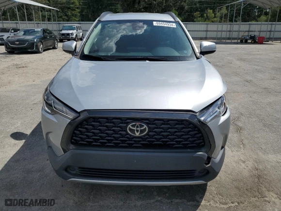 2022 Toyota Corolla Cross LE with VIN 7MUCAAAG4NV021312, listed as a Copart auction lot 69494934 with NaN miles and Salvage Title. Bid and sale history available at carsss.com. Image 5.